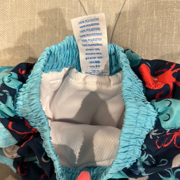 i play. Blue and Red Swim Trunks with Ocean-Themed Design - Picture 3 of 5